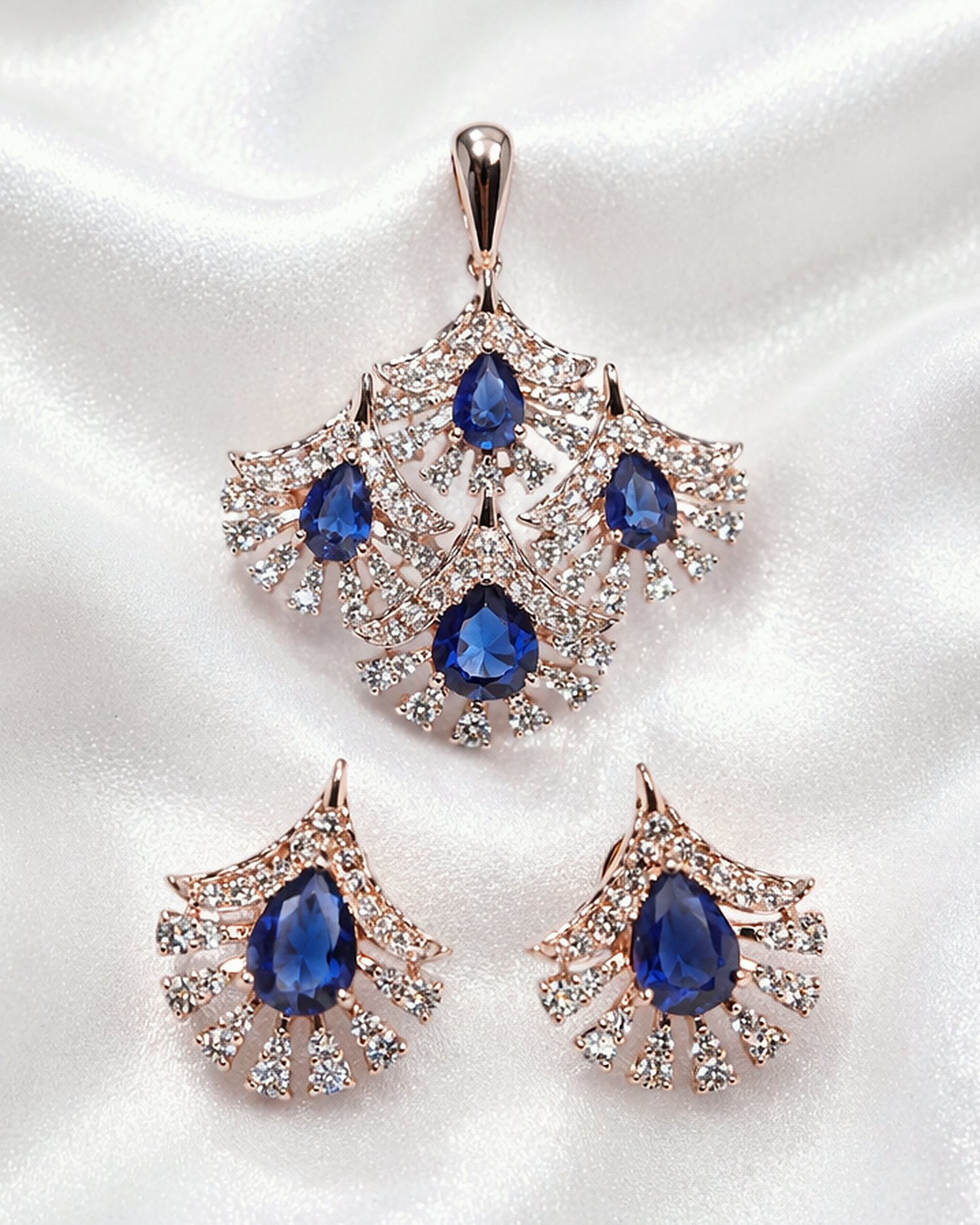Sapphire and diamond pendant set on satin
